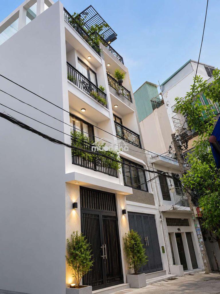 Bán nhà đường lạc long quân, hxh (4x 14m x 4 tầng) giá:nhỉnh 6ty tl