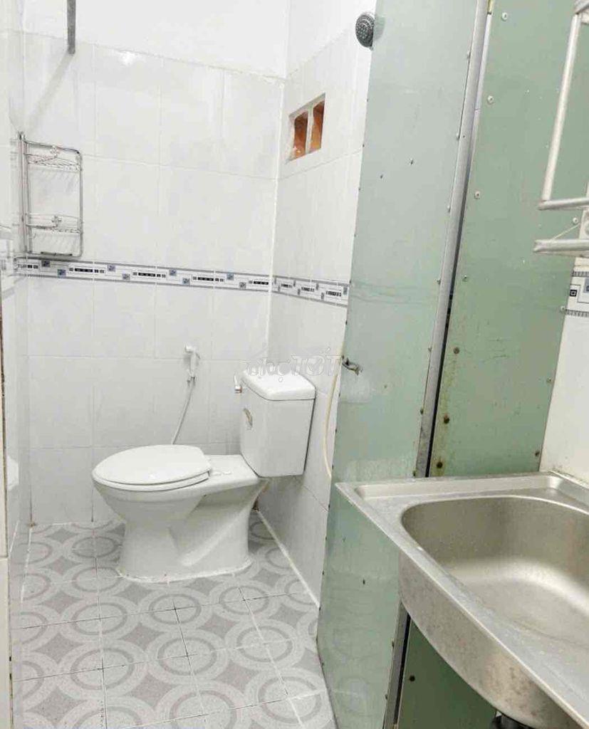 Nhà trọ 1 trệt 1 lầu ở phạm văn đồng ốp gạch - 4