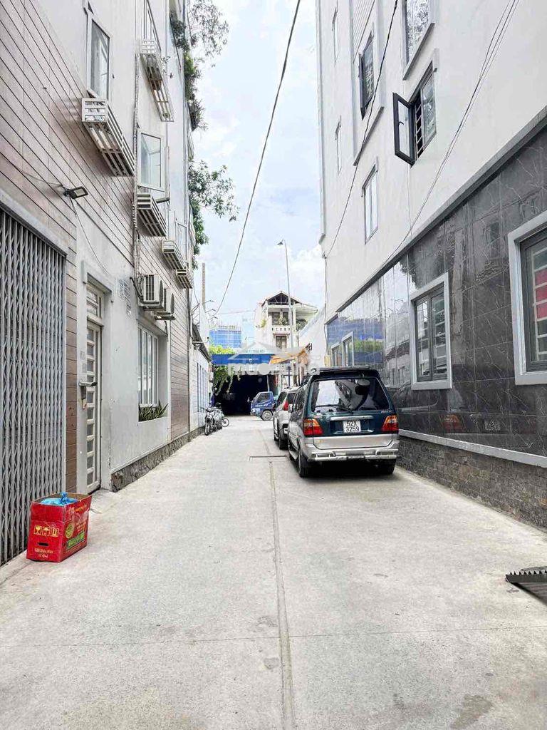 Dt 4m x 15m công nhận 60m. nhà 5 tầng. đường xe hơi vào nhà - 2